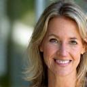 Headshot of Jen P., a smiling woman in her mid-40s.