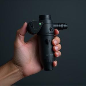 Theragun Mini, a compact percussive massage device.